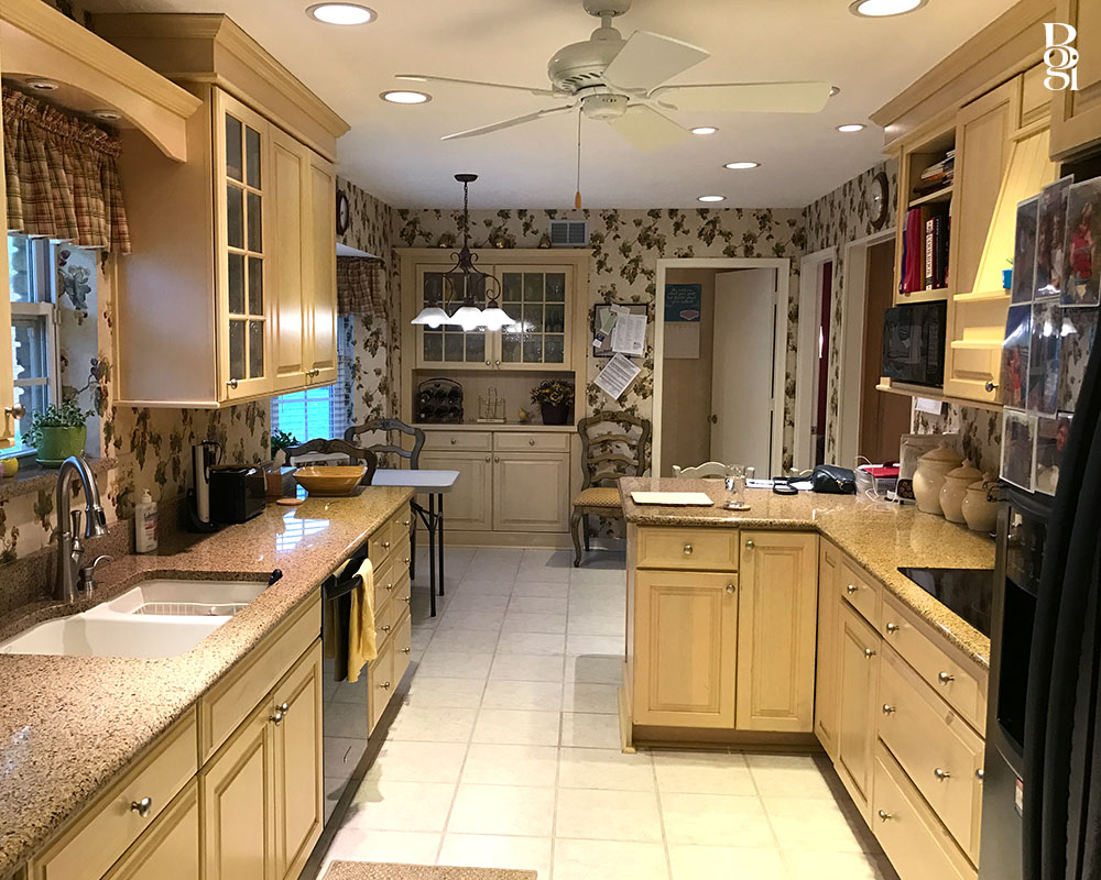 a 90's kitchen with an eat-in dining room