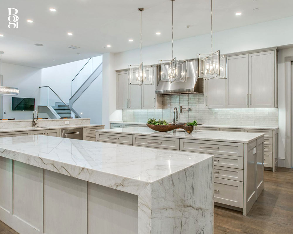brand new marble kitchen with light gray and white marbling and square gold glass lighting