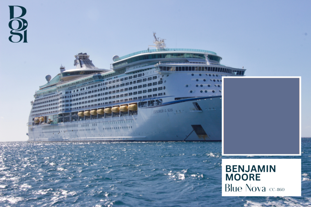 giant passenger ship floating in the ocean displaying the Benjamin Moore color of the year which is Blue Nova CC-860