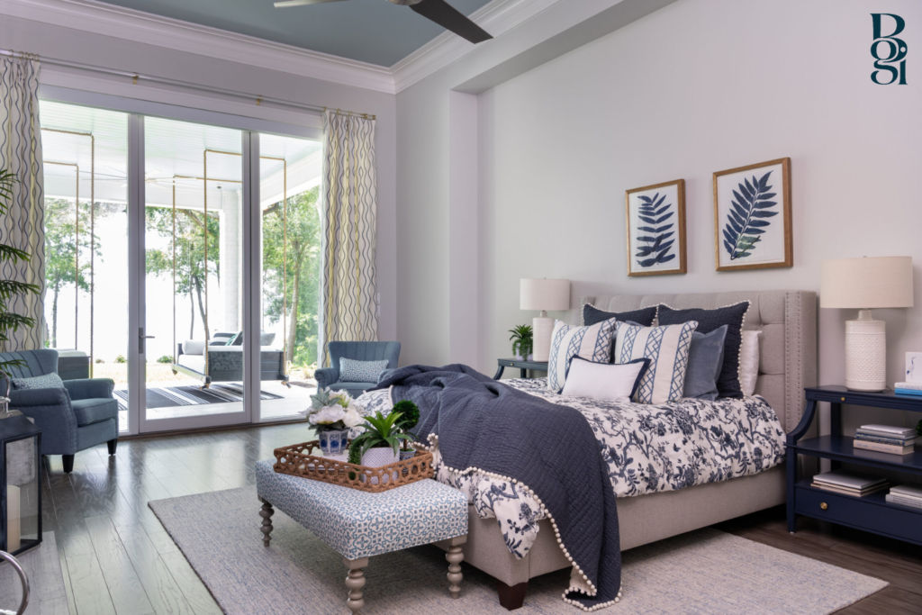 blue colored bedroom with a beautiful viewed full window and a vibrant blue painted ceiling